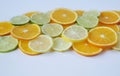 Sliced rings of orange and lemon, and lime isolated on white background Royalty Free Stock Photo