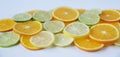 Sliced rings of orange, lemon, lime on white background. . Healthy food, detox, diet. Royalty Free Stock Photo