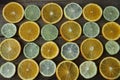 Sliced rings of orange, lemon, lime on wood background. Healthy food., detox, diet. Royalty Free Stock Photo