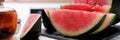 Sliced ripe watermelon lies on the table, close-up Royalty Free Stock Photo