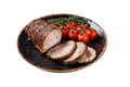 Sliced roast pork roulade - Porchetta on a plate with spices. Isolated on white background. Top view. Royalty Free Stock Photo