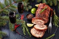 Sliced roast pork roulade with red wine Royalty Free Stock Photo