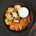 Sliced roasted chicken breast and fried cauliflower Royalty Free Stock Photo