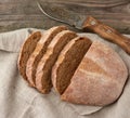 Sliced round baked rye flour bread