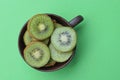 sliced round green pieces of fresh kiwi fruit