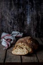 Sliced Round No Knead Rustic Bread on a Wooden Table