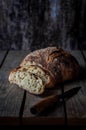 Sliced Round No Knead Rustic Bread on a Wooden Table