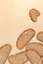 sliced of rye bread, isolated on a brown background