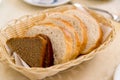 Sliced rye and wheat bread in wicker basket Royalty Free Stock Photo