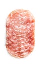 Sliced salami. Chopped pork sausage isolated on white background Royalty Free Stock Photo