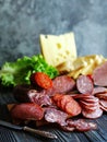 Sliced sausage , meat delicatessen sausage , ingredients for sandwiches Royalty Free Stock Photo