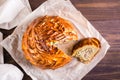 Sliced savory pie with chicken, potatoes and rice. Homemade pastries. Top view. Closeup Royalty Free Stock Photo