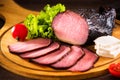 Sliced and served smoked meat. Royalty Free Stock Photo