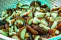 Sliced shiitake mushrooms in an iron basket Royalty Free Stock Photo