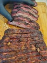 Sliced smoked Brisket with smoke ring. Royalty Free Stock Photo