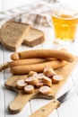 Sliced smoked frankfurter sausages on cutting board Royalty Free Stock Photo