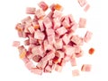 Sliced smoked ham, cubes, heap, isolated on white background Royalty Free Stock Photo