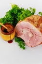 Sliced smoked pork ham with honey in jar Royalty Free Stock Photo