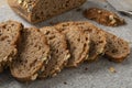 Sliced sourdough loaf of bread with a variation of seeds close up