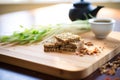 sliced sprouted bread on a bamboo board Royalty Free Stock Photo