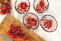 Sliced Strawberries in Clear Glass Bowls, Sliced Strawberries on a Chopping Board, Fruit Salad, Dessert Royalty Free Stock Photo