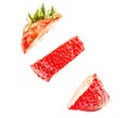 Sliced strawberry floating in the air isolated on white background. Strawberry in pieces in the air. Royalty Free Stock Photo