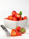 Sliced strawberry and fruit knife Royalty Free Stock Photo