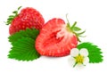 Sliced strawberry with green leaves and flower isolated on white background. clipping path Royalty Free Stock Photo
