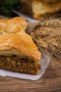 Sliced succulent meat pie with mushrooms and meat