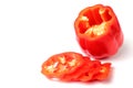 Sliced sweet bell pepper close-up on a white background, top view, flat lay, isolate, copy space Royalty Free Stock Photo
