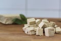 Sliced tofu on wooden board
