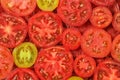 Sliced tomatoes background. Royalty Free Stock Photo