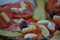 Sliced tomatoes with cheese and olives and cucumber and eggs in slice with salt kristalls