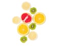 Sliced tropical fruits close-up on white isolated background. View from above Royalty Free Stock Photo