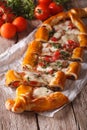 Sliced Turkish pide close up and ingredients. vertical top view Royalty Free Stock Photo