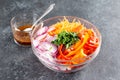 Sliced vegetables in a bowl for making a savory salad with bell peppers, carrots, vegetables and sesame seeds. Step by step recipe Royalty Free Stock Photo