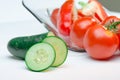 Sliced vegetables on Glass Plate white background Royalty Free Stock Photo