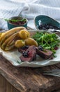 Sliced venison steak dinner Royalty Free Stock Photo