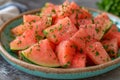 Sliced watermelon on a blue plate Royalty Free Stock Photo