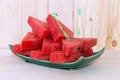 Sliced watermelon on green plate Royalty Free Stock Photo