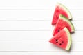 Sliced watermelon on kitchen table Royalty Free Stock Photo