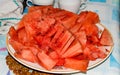 Sliced watermelon and peeled on a plate Royalty Free Stock Photo