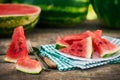 Sliced watermelon on table and plate Royalty Free Stock Photo