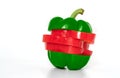 Sliced wet red and green pepper or Bell pepper on white background, slice and rearrange by two green parts on top and bottom and