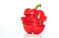 Sliced wet red pepper or Bell pepper on white background, slice and rearrange to original shape, front view image