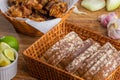 Sliced white bread with wheat flour on a wooden table. Chamado PÃÂ£o de forma