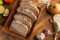 Sliced white bread with wheat flour on a wooden table. Chamado PÃÂ£o de forma