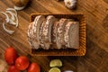 Sliced white bread with wheat flour on a wooden table. Chamado PÃÂ£o de forma