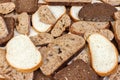 Sliced white and brown loaf of bread Royalty Free Stock Photo