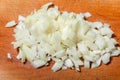 Sliced white onion on the board during the preparation of meals. Protection against the flu and colds.